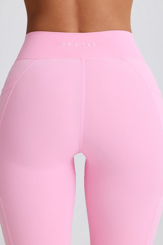 Pink Flared Leggings with Side Pockets